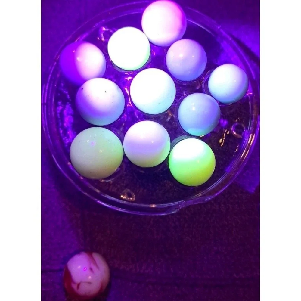 Lot Of 11 Estate Sale Marbles All UV Reactive Plus 1 UV Reactive Shooter Marble.